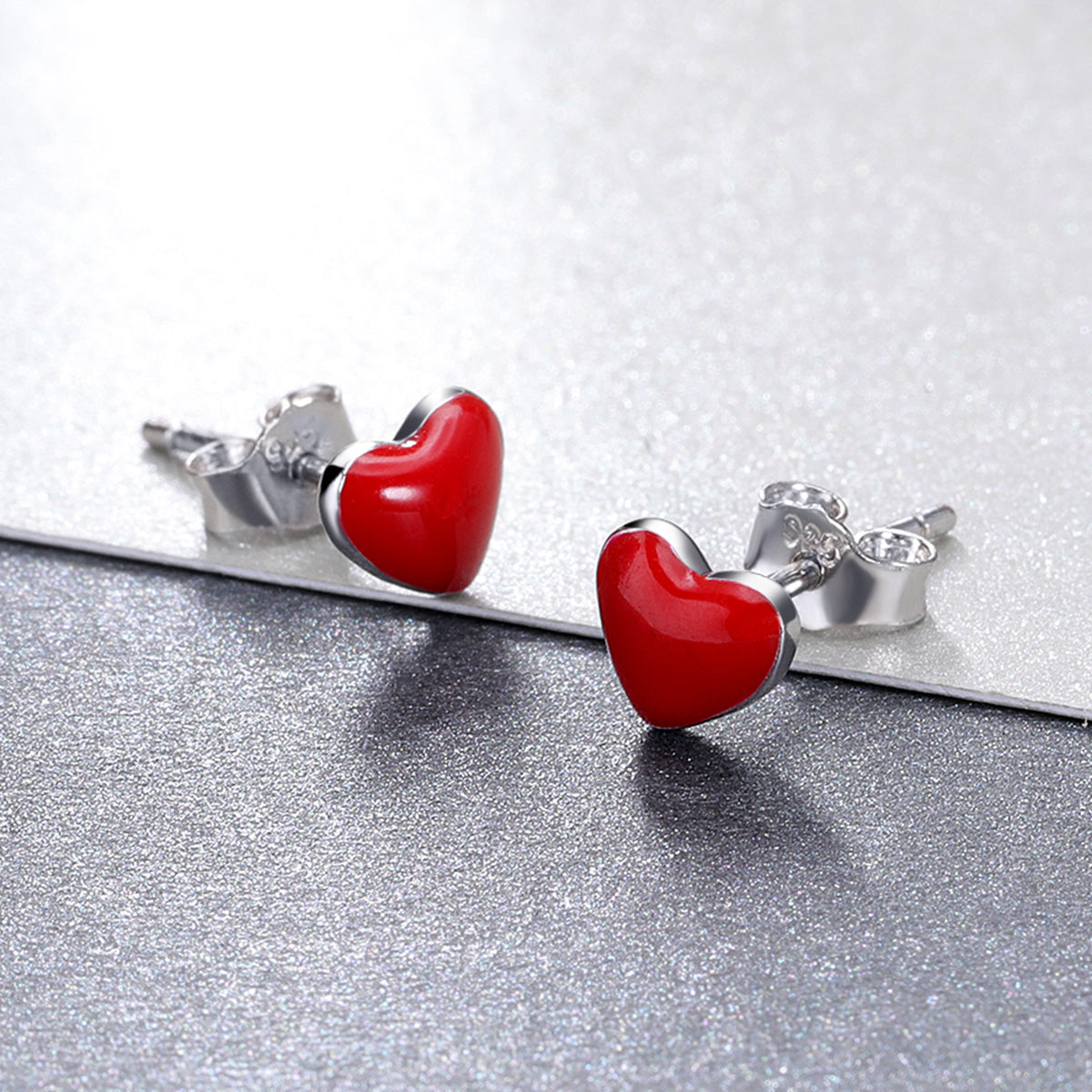 Boucles d'oreilles clous coeur rouge en argent 925